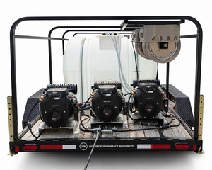 A heavy-duty trailer-mounted performance machinery setup with three black engines, a large white water tank, and a metal drum or filter component under a black frame, photographed on a white studio background.