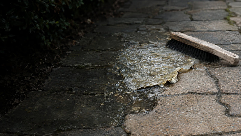 Stripping old peeling sealer from interlocking concrete pavers